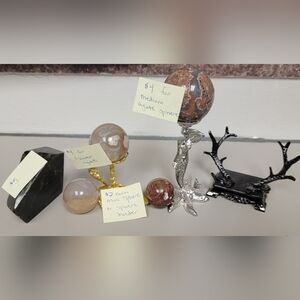 Crystal spheres, holder, freedom